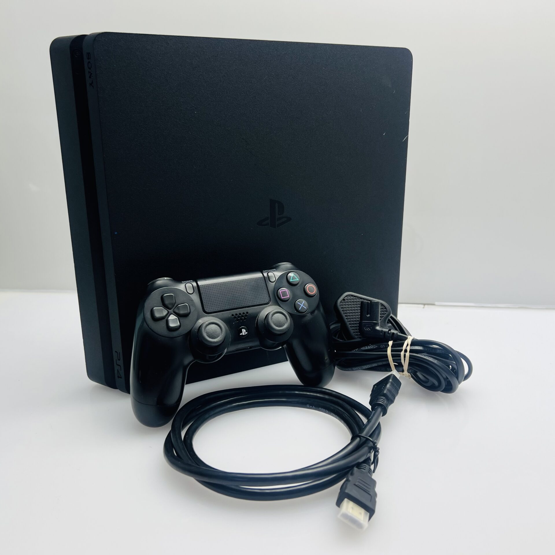 PlayStation 4 Slim Black 1TB + 1 Controller + HDMI Cable + Power Cable (Grade B) - Image 8