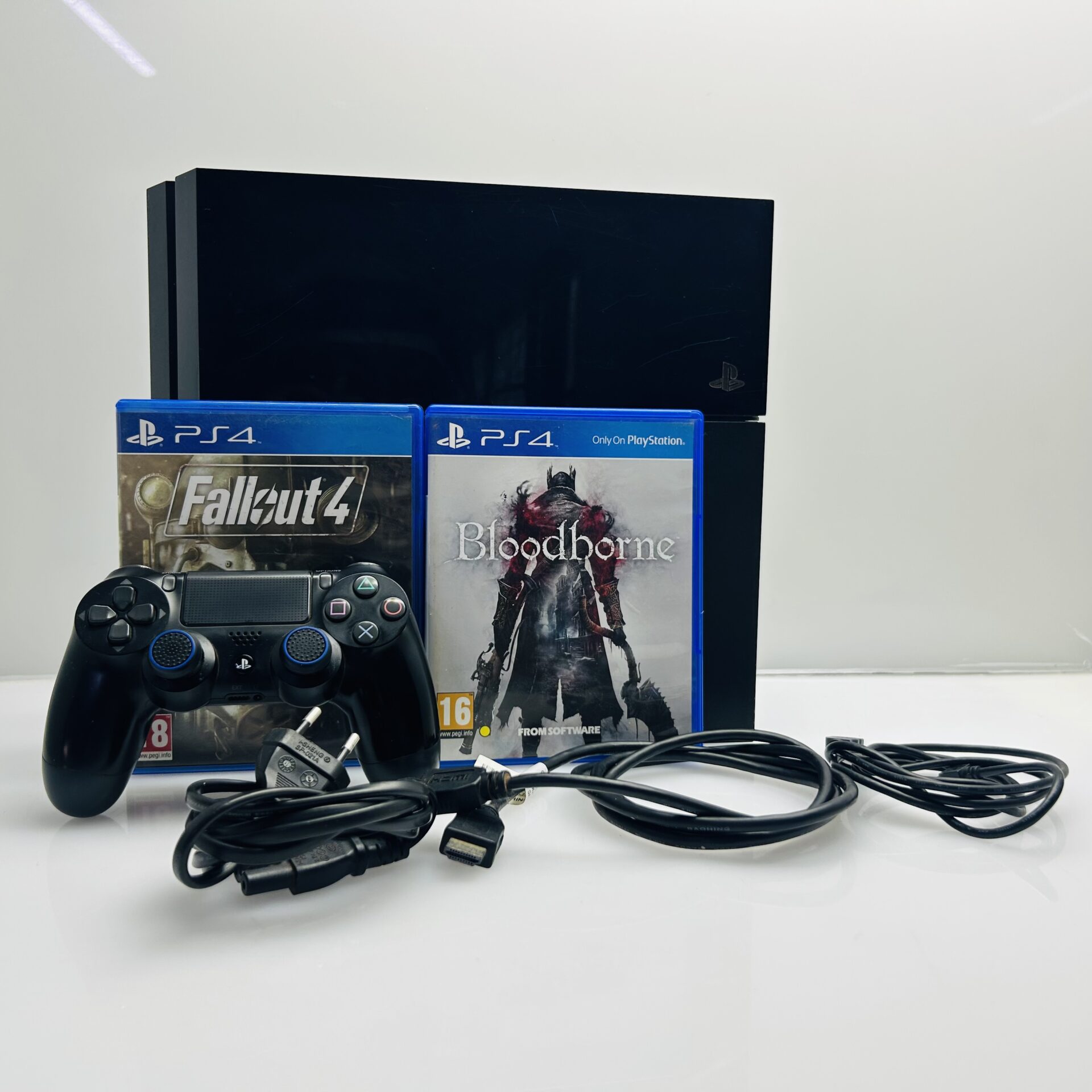 PlayStation 4 Original Black 500GB + 1 Controller + HDMI Cable + Power Cable + 2 Games – (Grade B) - Image 9