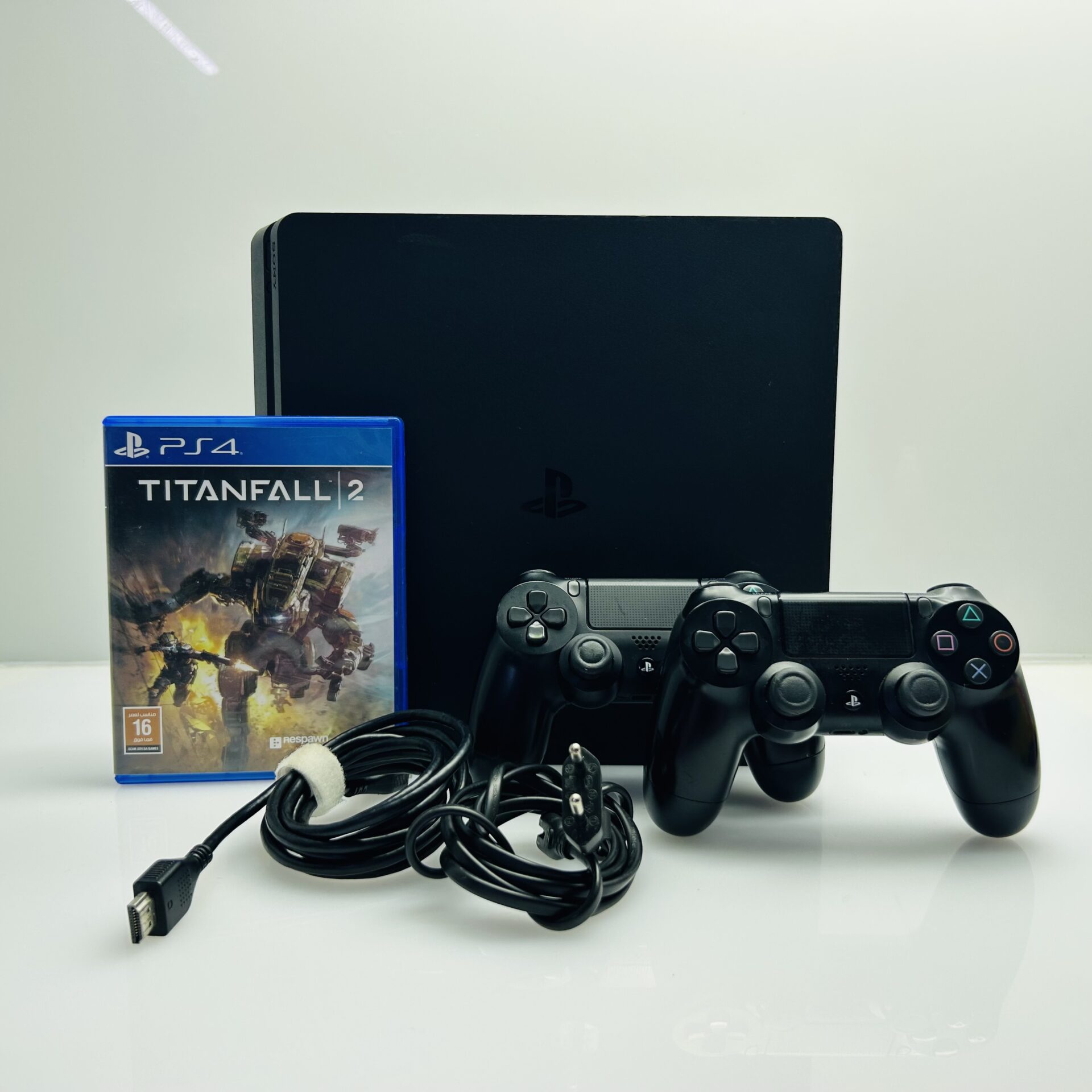 PlayStation 4 Slim Black 1TB + 2 Controllers + HDMI Cable + Power Cable + 1 Game (Grade B) - Image 8