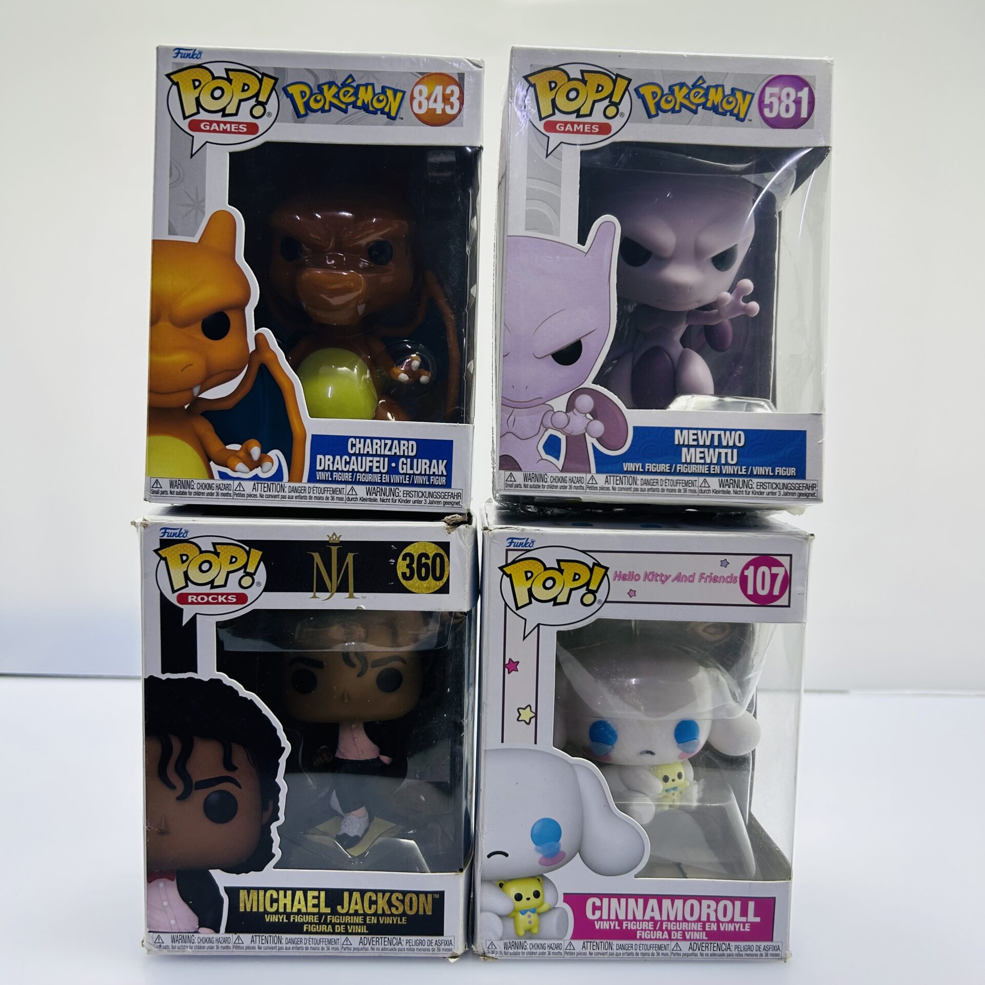 COMBO DEAL: Funko Pop Mewtwo 581, Charizard 843, Cinnamoroll 107, Michael Jackson 360 (Condition: Good) - Image 2