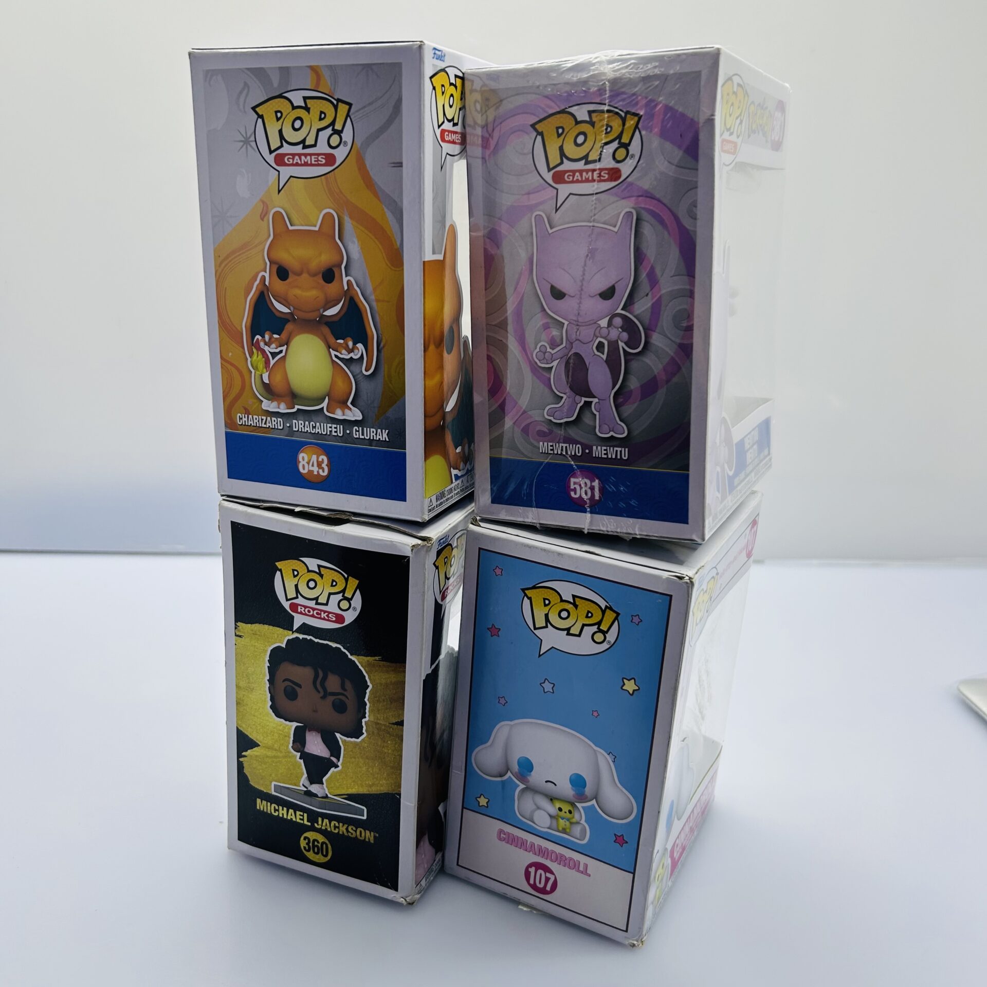 COMBO DEAL: Funko Pop Mewtwo 581, Charizard 843, Cinnamoroll 107, Michael Jackson 360 (Condition: Good) - Image 3