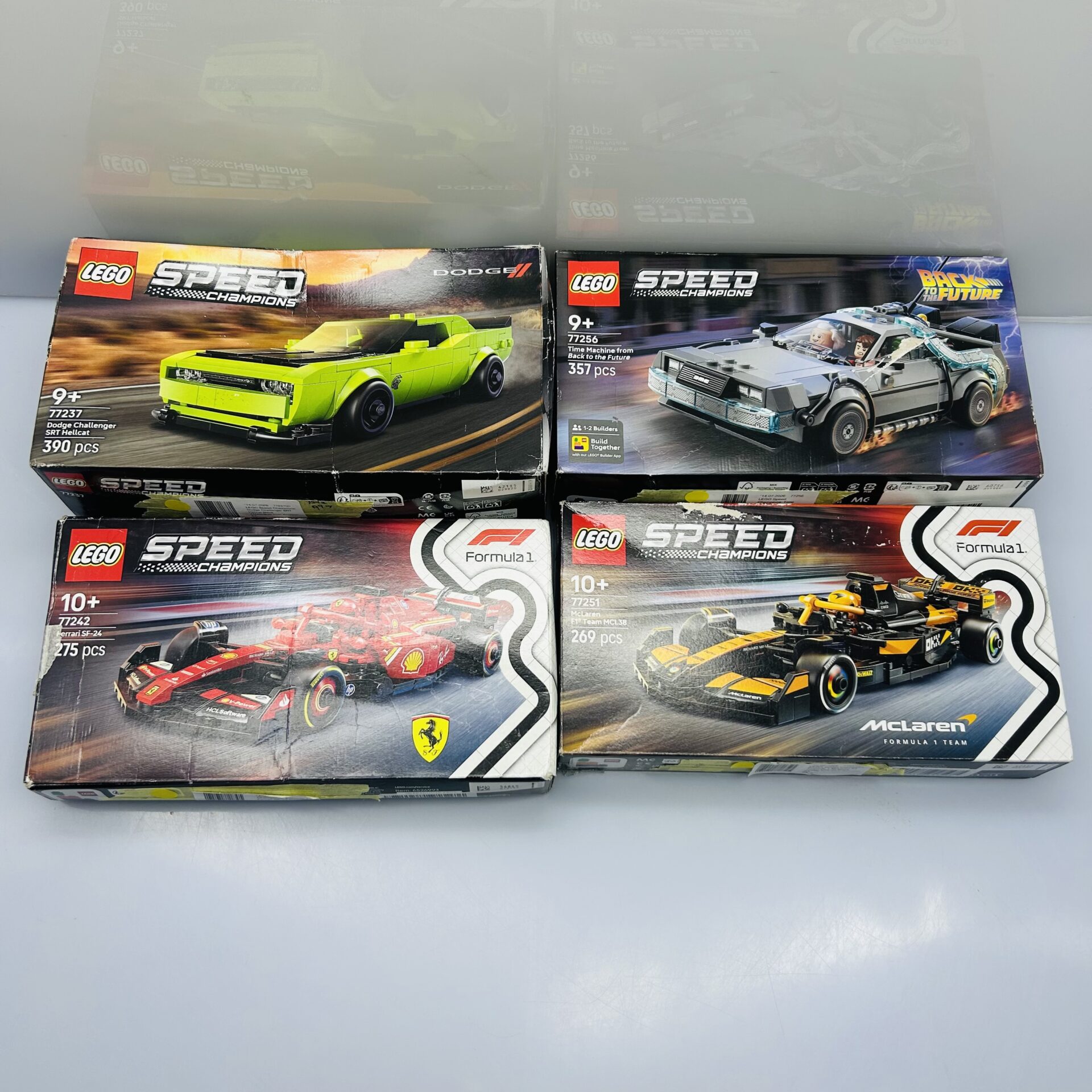 COMBO DEAL: LEGO® Speed Champions: McLaren MCL38 77251 + Ferrari SF-24 77242 + Dodge Challenger 77237 + Back to the Future 77256 (Condition: Good) - Image 2